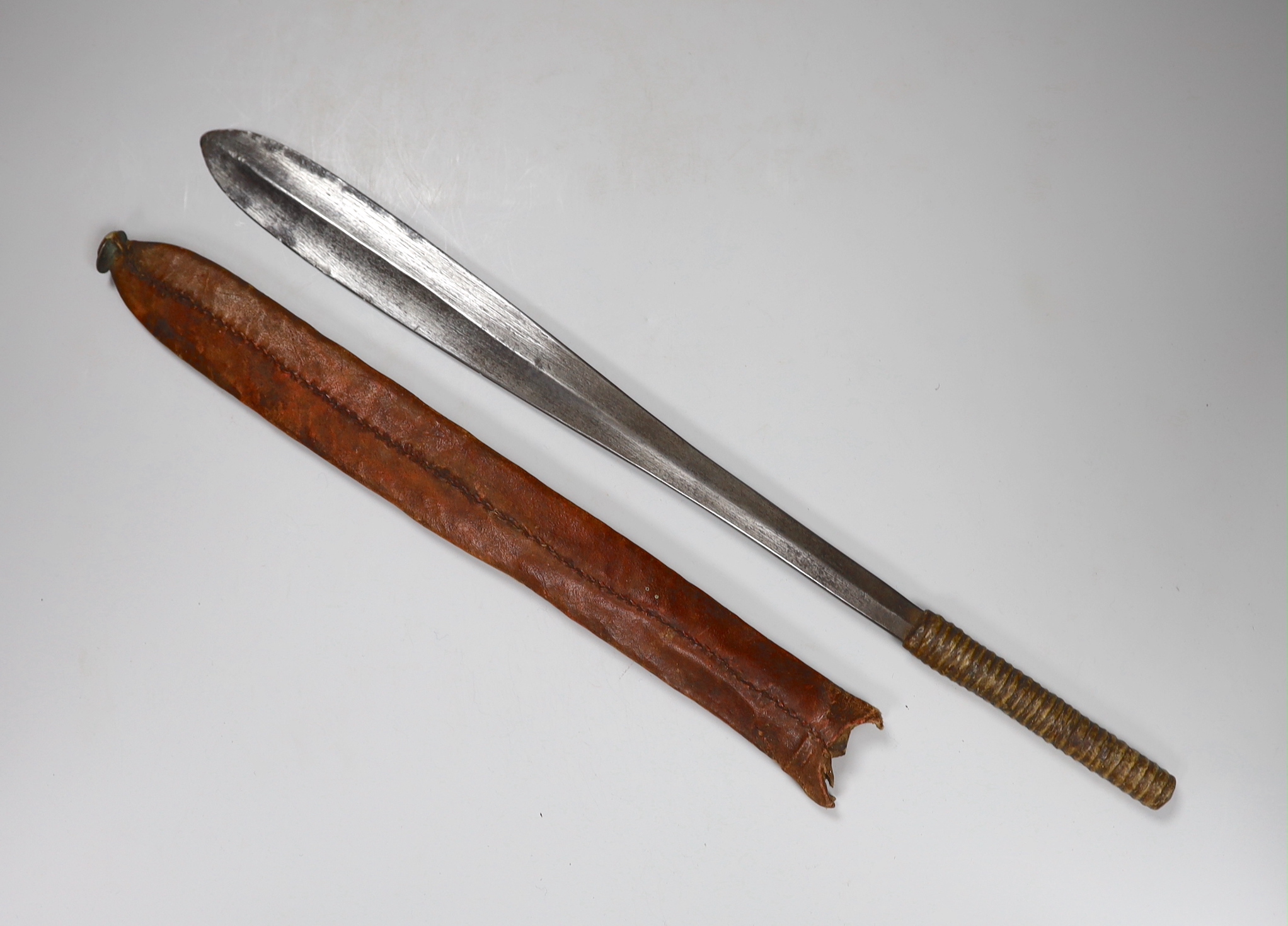 An African Maasai simi short sword in red sheath, 53cm long